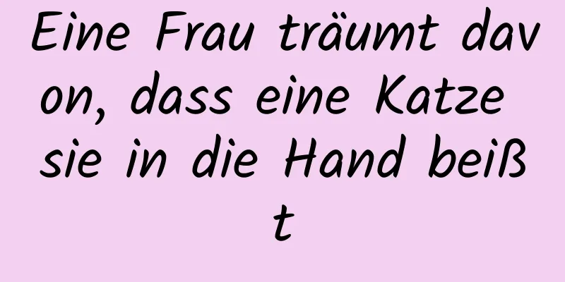 Eine Frau träumt davon, dass eine Katze sie in die Hand beißt