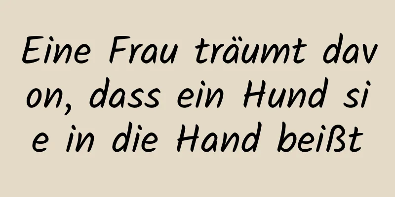 Eine Frau träumt davon, dass ein Hund sie in die Hand beißt