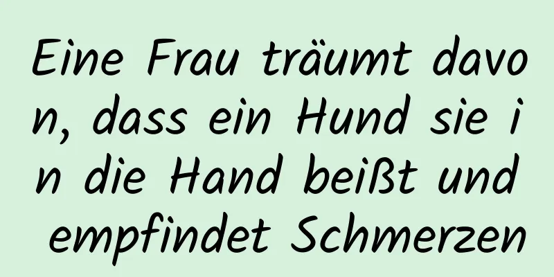 Eine Frau träumt davon, dass ein Hund sie in die Hand beißt und empfindet Schmerzen