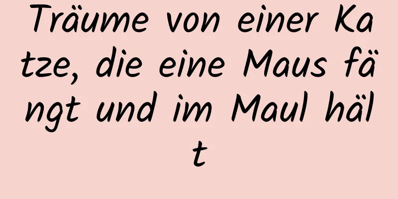 Träume von einer Katze, die eine Maus fängt und im Maul hält